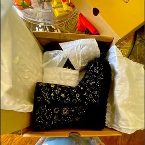 Size 7 women’s UGG black embellished boots.  Brand new.  Never worn.
